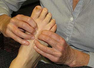 Christine doing Reflexology